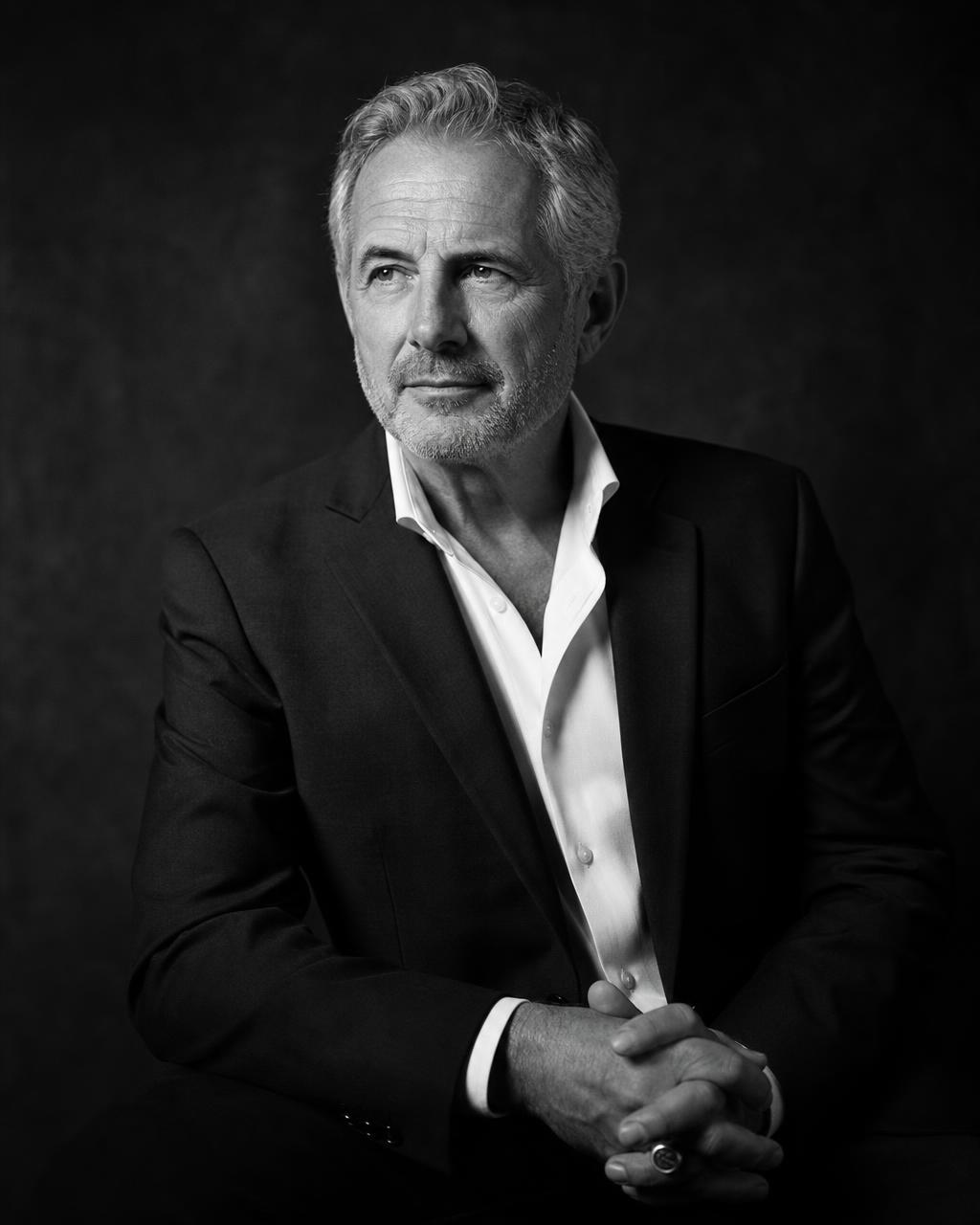 Portrait of Adrian Vale, Founder & Managing Partner